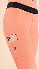 24271021 - Legging Feminina  c/ Recorte Tule e Bolsos Coral